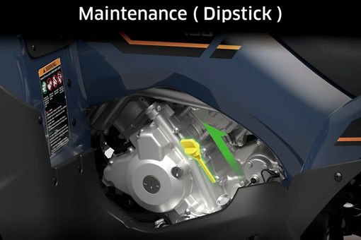 Cutaway image showing how to access the oil dipstick of an ATV. opens in a new window