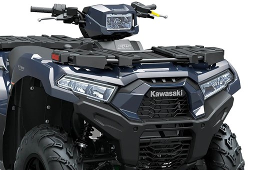 Detail view of the front end and grille of a utility ATV in a white studio background. opens in a new window