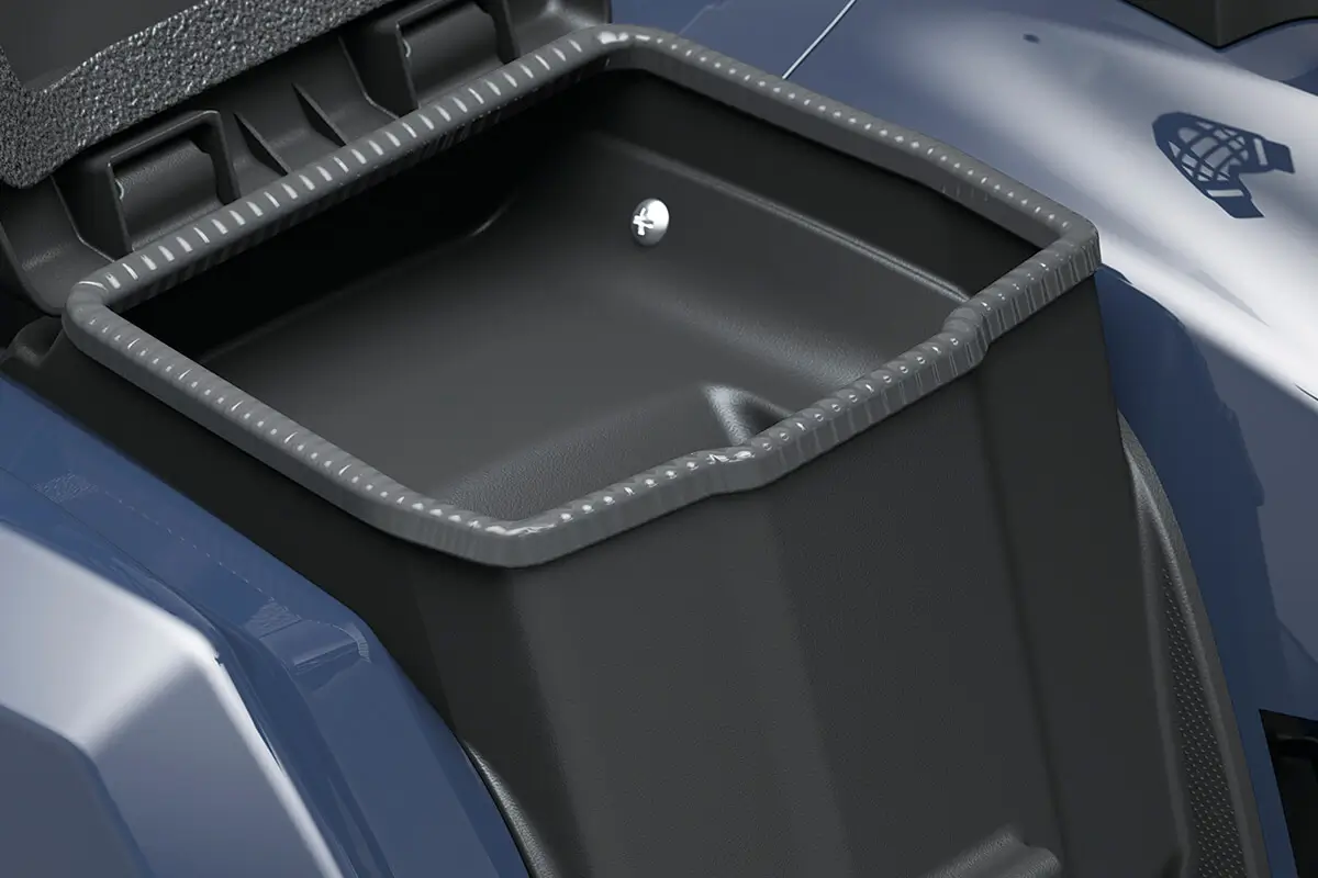Detail view of an enclosed storage compartment on a utility ATV.