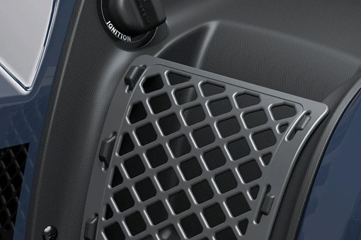 Detail view of a storage compartment on a utility ATV. opens in a new window