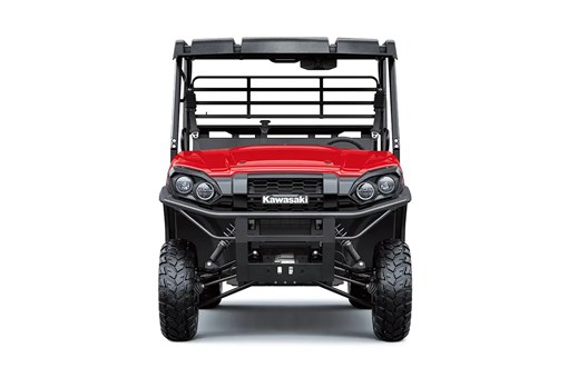 Head-on view of a red side x side staged in a white studio background. opens in a new window