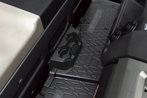 Detail view of front cup holders of a side x side. opens in a new window