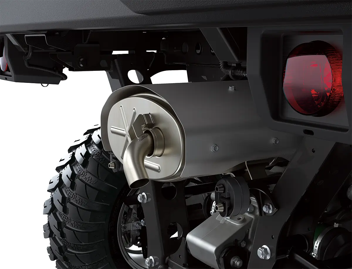 Detail photo of rear exhaust of a side x side staged in a white studio background.