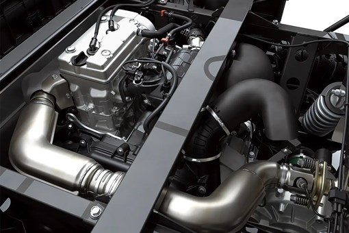 Engine compartment of a side x side staged in a white studio background. opens in a new window