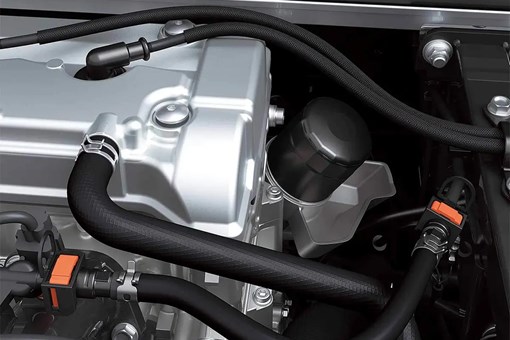 Detail photo of the oil filter of a side x side engine. opens in a new window