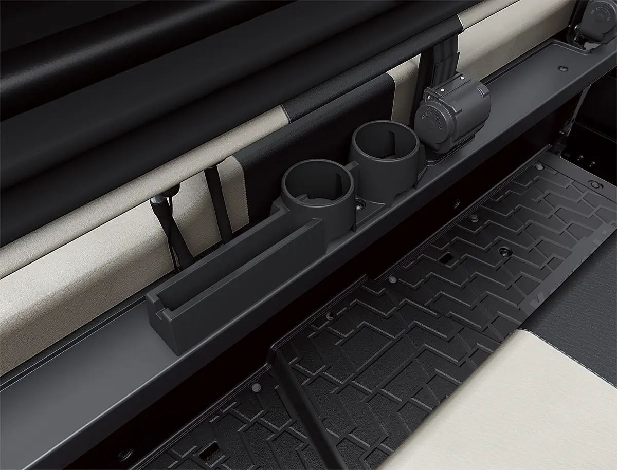 Detail view of rear seat cup holders of a side x side.