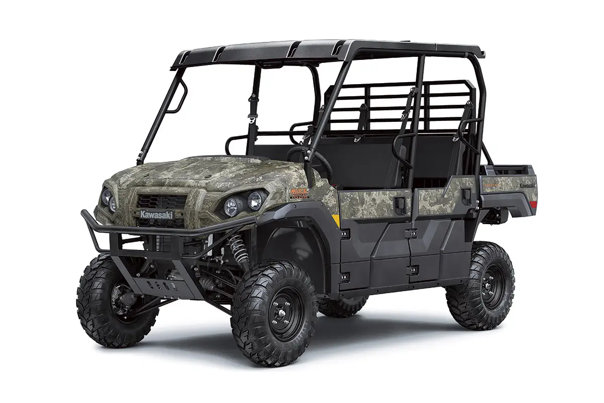 Front three-quarter view of a camo side x side staged in a white studio background.