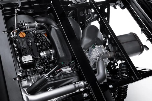 Engine compartment of a side x side staged in a white studio background. opens in a new window