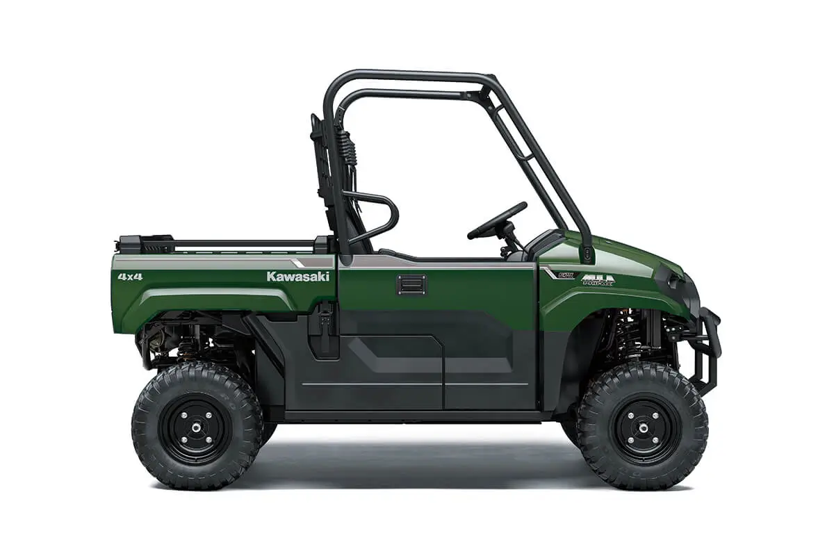 Right side view of a green side x side staged in a white studio background.