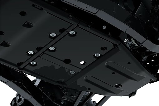 Close-up of the skid plate of a side x side staged in a white studio background. opens in a new window