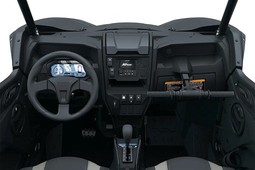 Interior POV of the steering wheel and dashboard of a side x side staged in a white studio background. opens in a new window