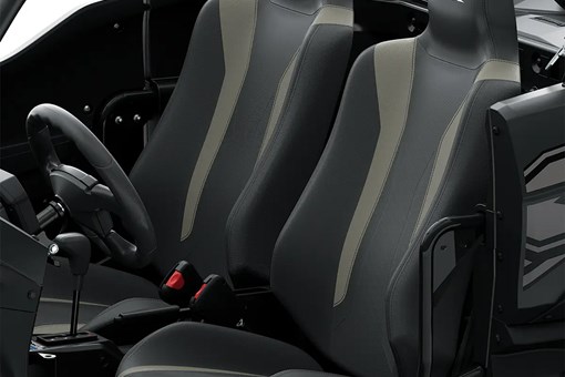 Three-quarter front angle of the two seats of a side x side staged in a white studio background. opens in a new window