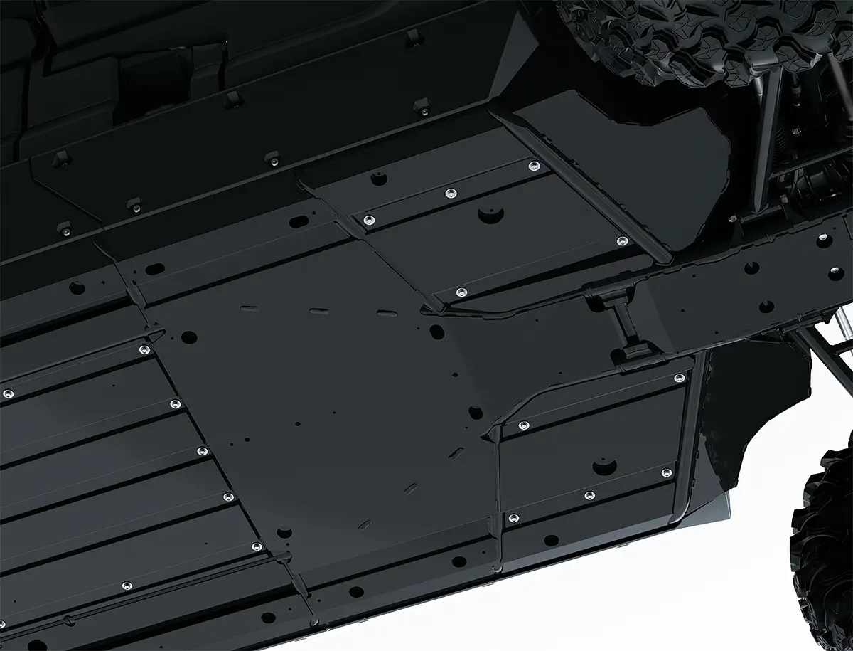 Bottom view of the skid plate of a side x side staged in a white studio background.