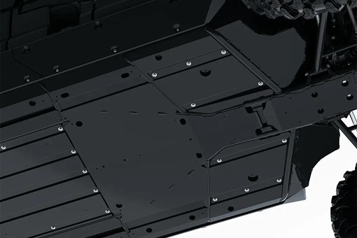 Bottom view of the skid plate of a side x side staged in a white studio background. opens in a new window