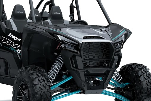 Close-up view of the front end of a side x side staged in a white studio background. opens in a new window