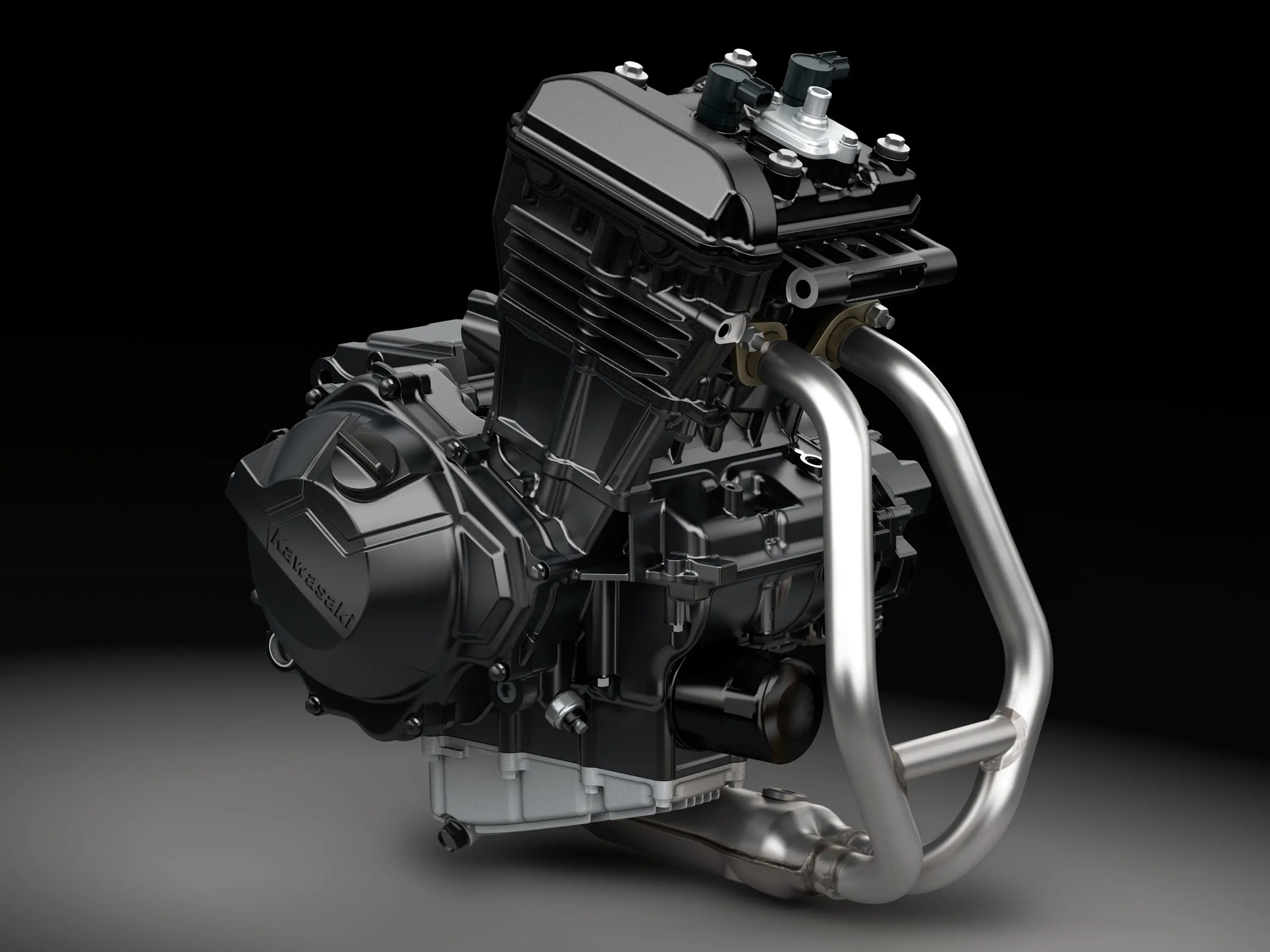 The engine bay of a motorcycle staged in a black studio background.
