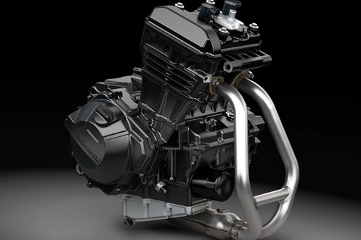 The engine bay of a motorcycle staged in a black studio background. opens in a new window