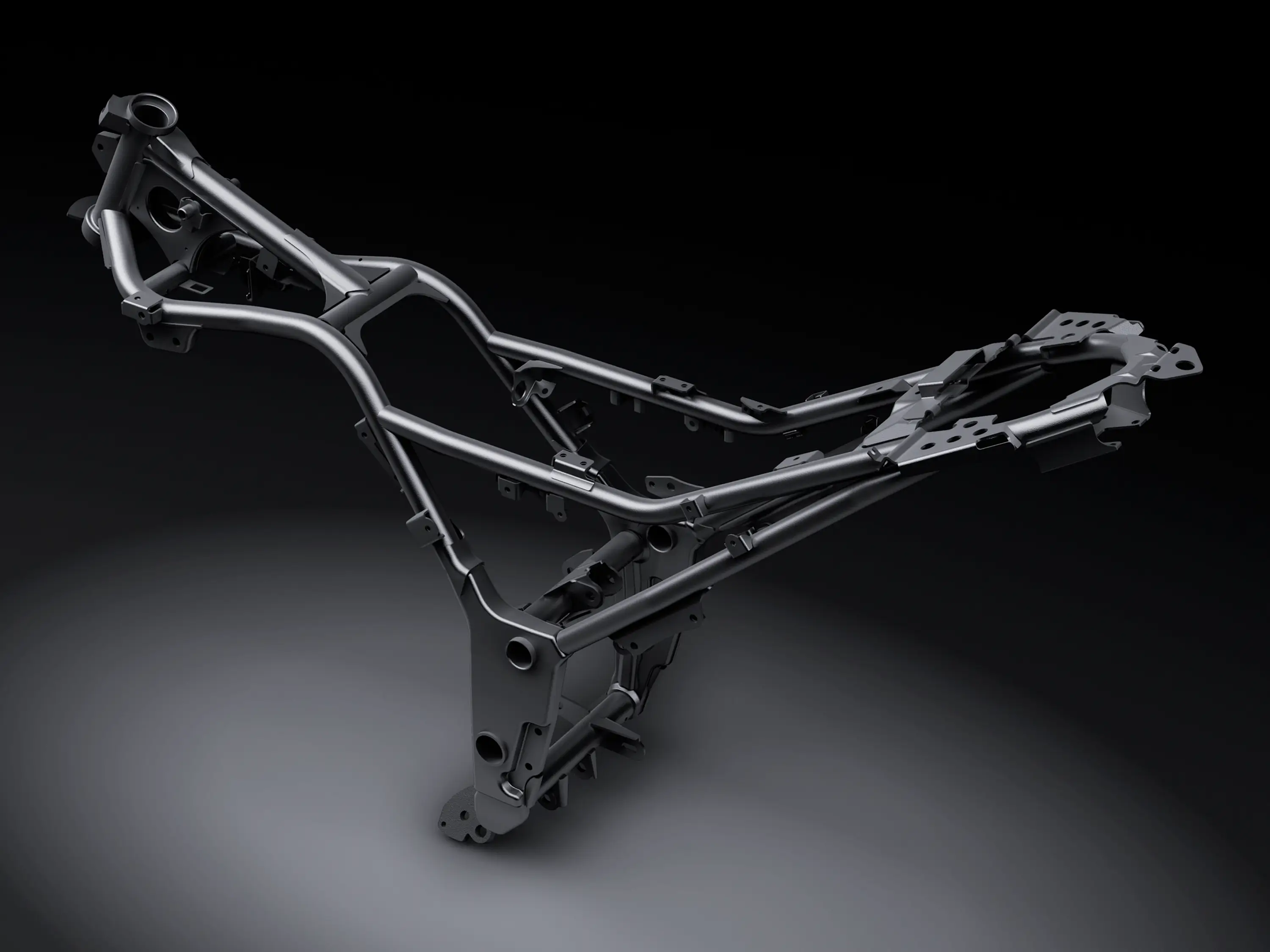 Side angle of the chassis of a motorcycle staged in a black studio background.