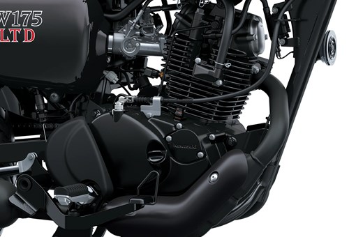 Close-up of the engine bay of a motorcycle staged in a white studio background. opens in a new window