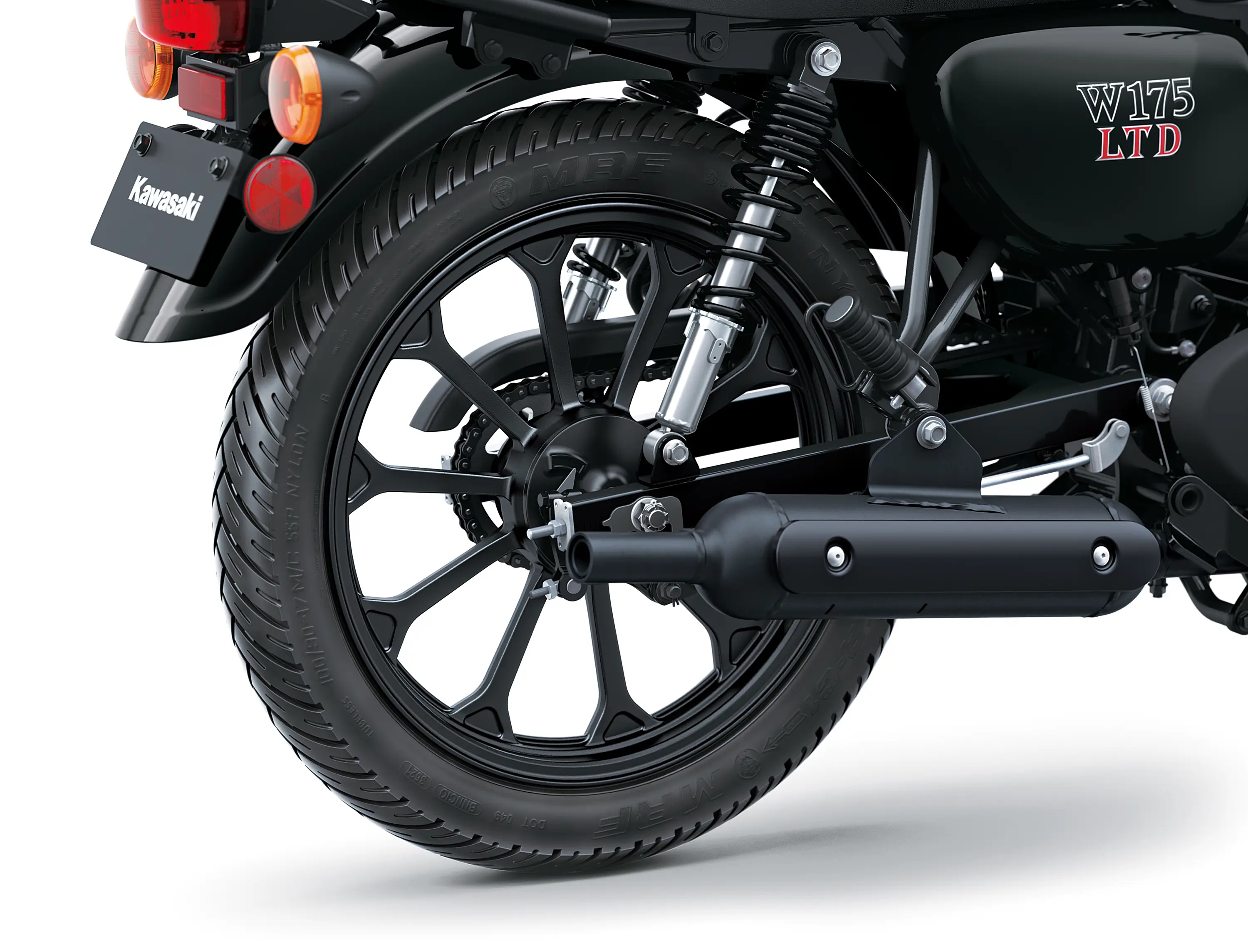 Close-up of the rear wheel and exhaust of a motorcycle staged in a white studio background.