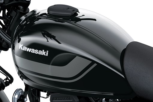 Close-up of the fuel tank of a motorcycle staged in a white studio background. opens in a new window
