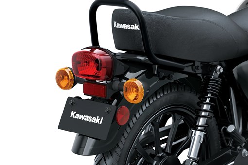 Close-up of the back end of a motorcycle staged in a white studio background. opens in a new window