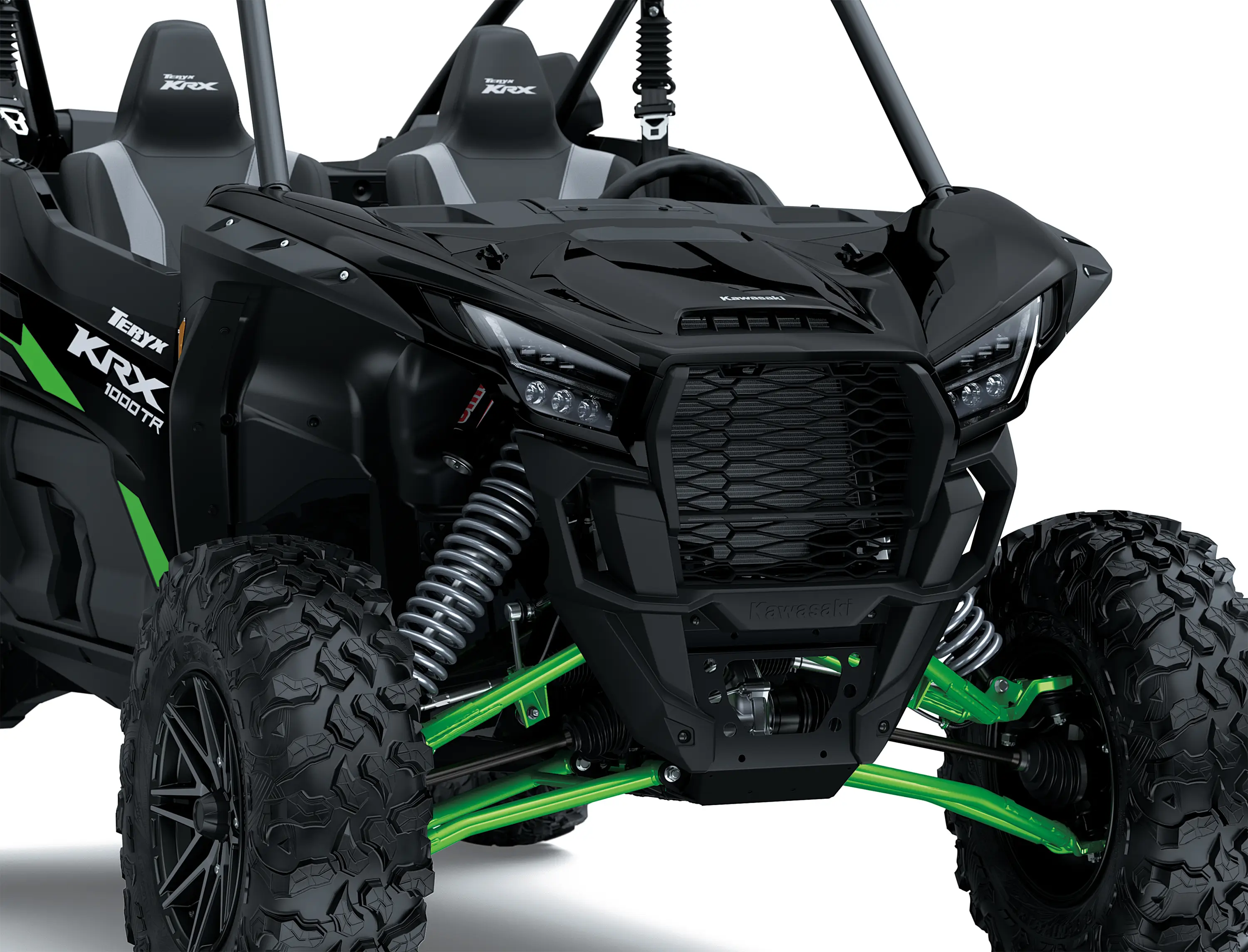 Close-up of the front end of a side x side staged in a white studio background.