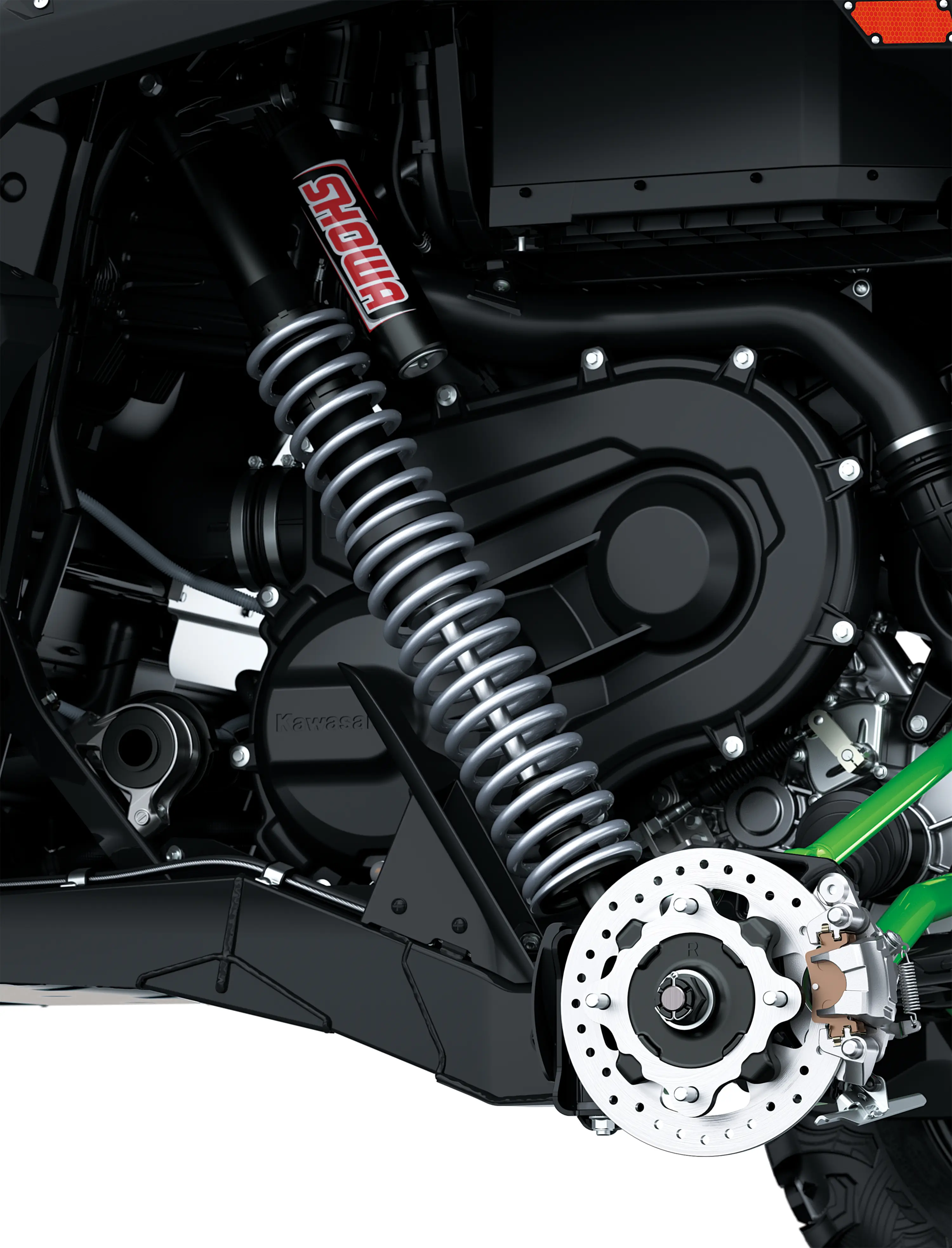 Close-up of the Showa shock of a side x side staged in a white studio background.