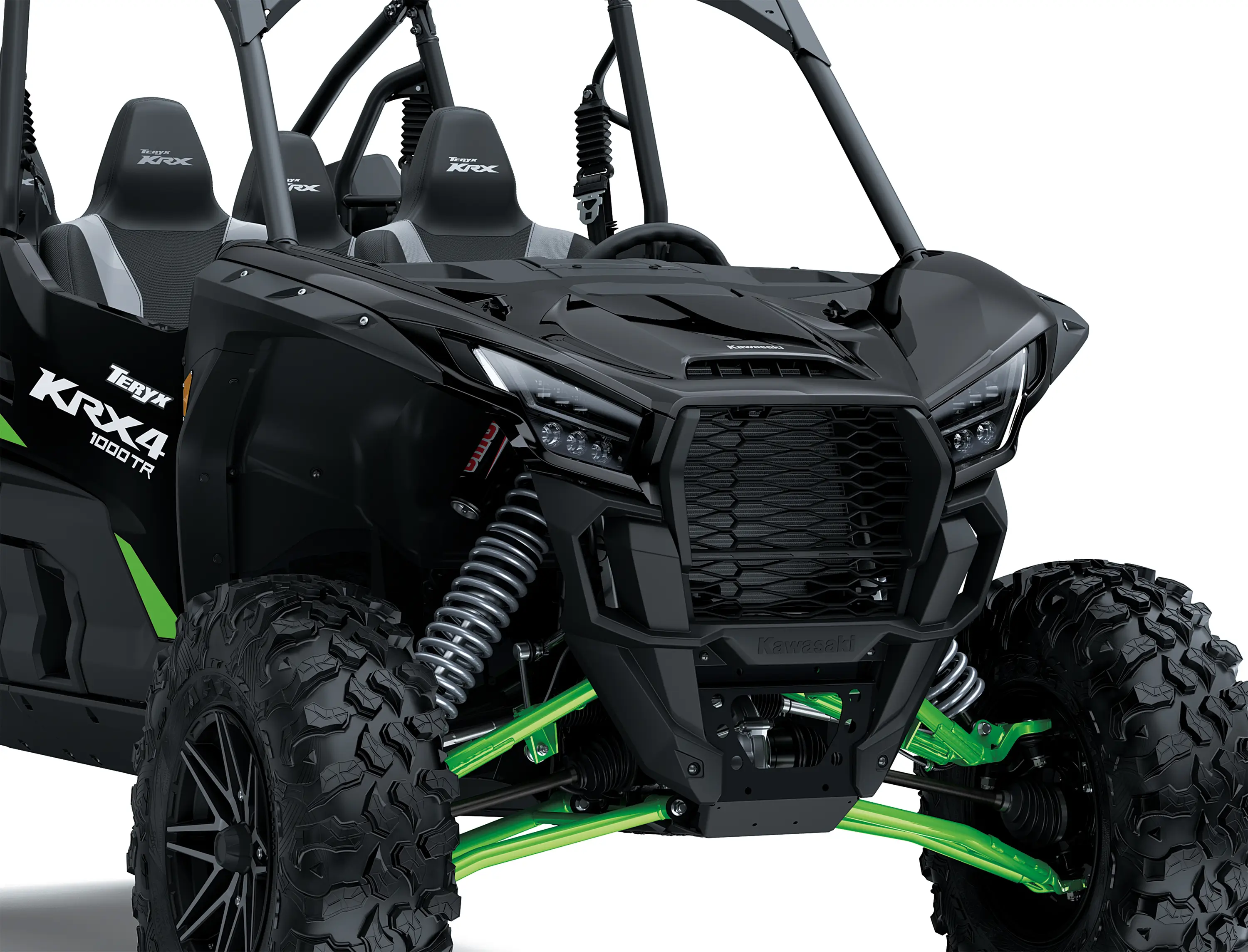 Close-up of the front end of a side x side staged in a white studio background.