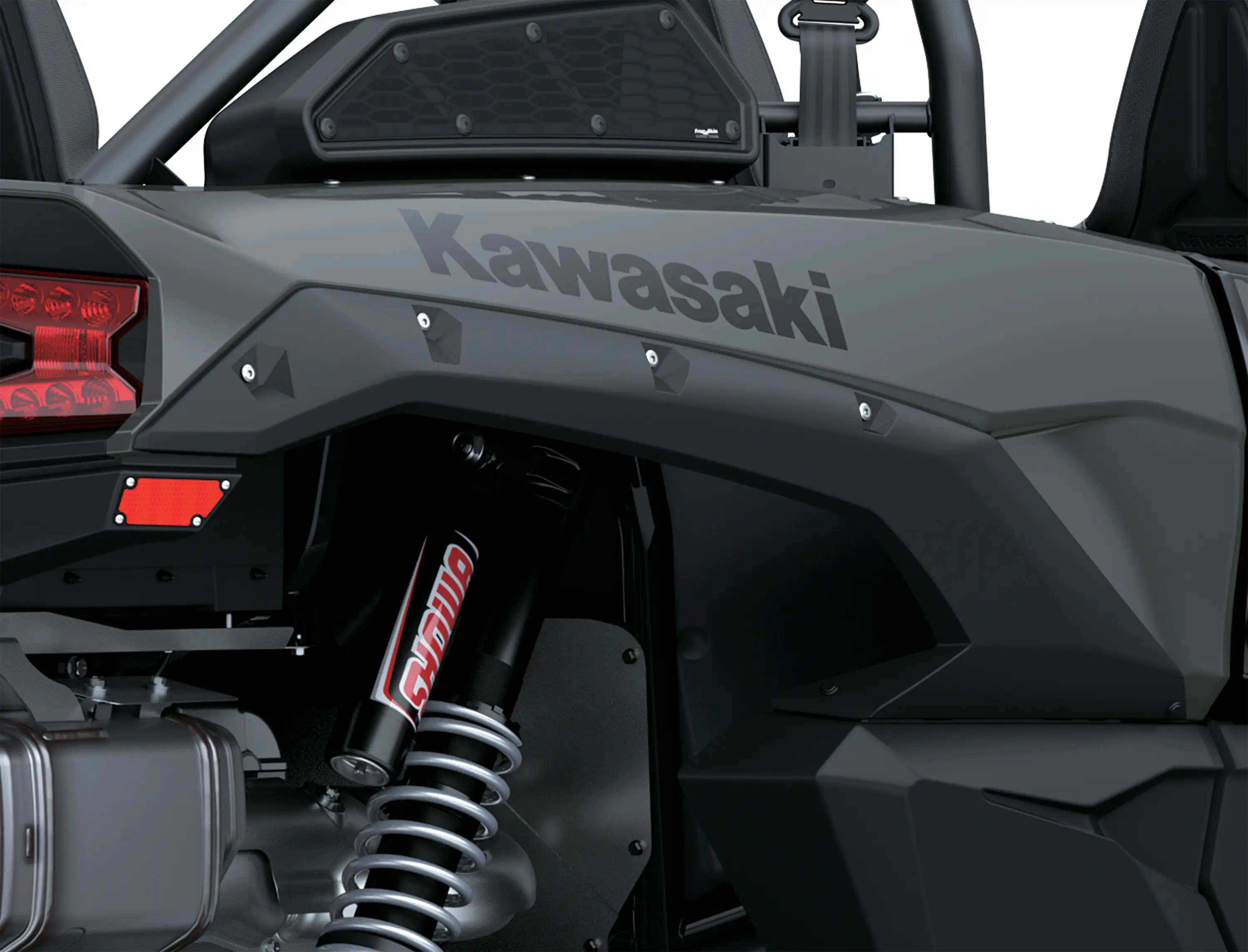 Close-up of the rear bodywork of a side x side staged in a white studio background.
