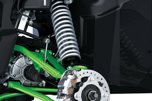 Close-up of the suspension system of a side x side staged in a white studio background. opens in a new window