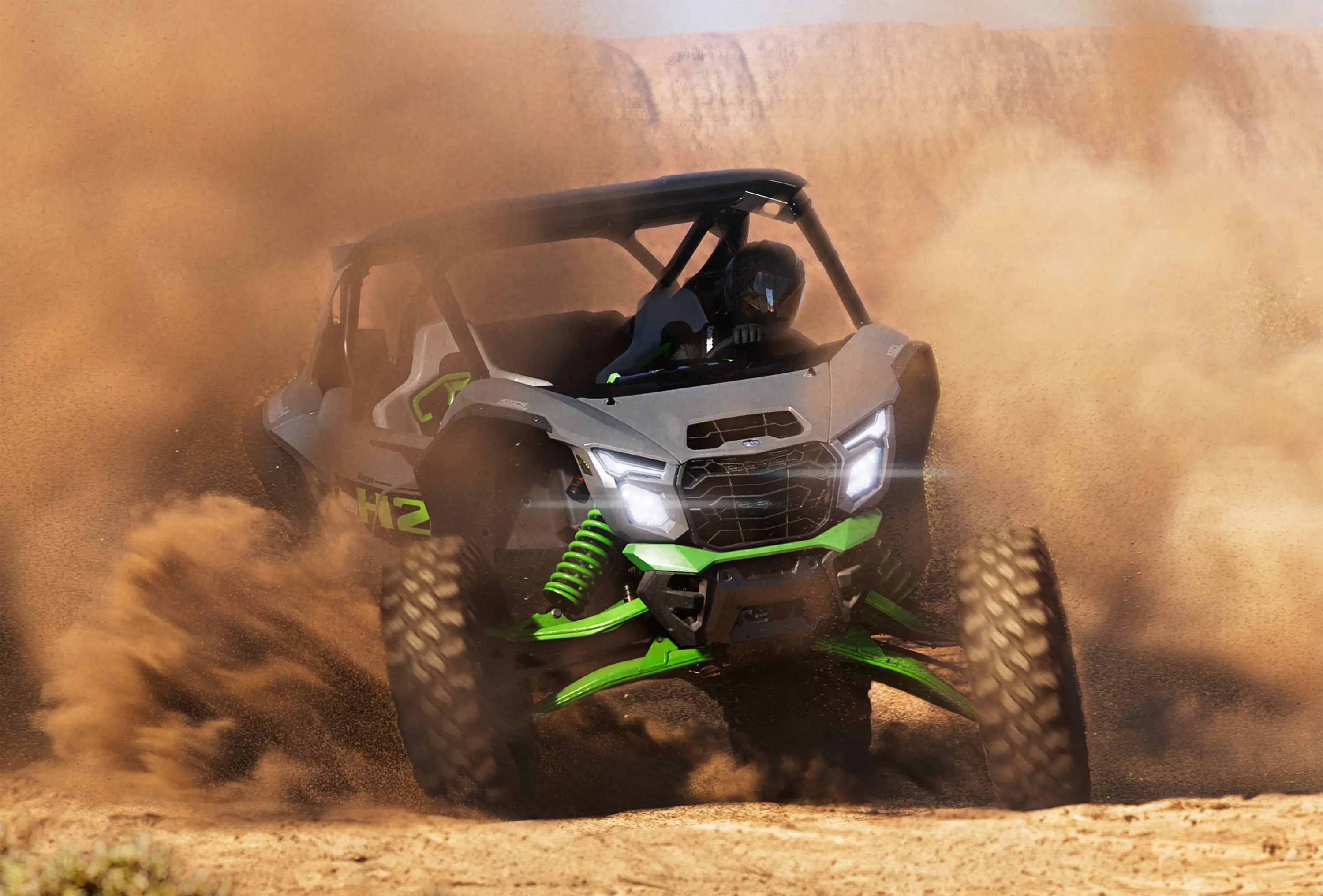 Three-quarter front angle of a person sliding a side x side off-road.