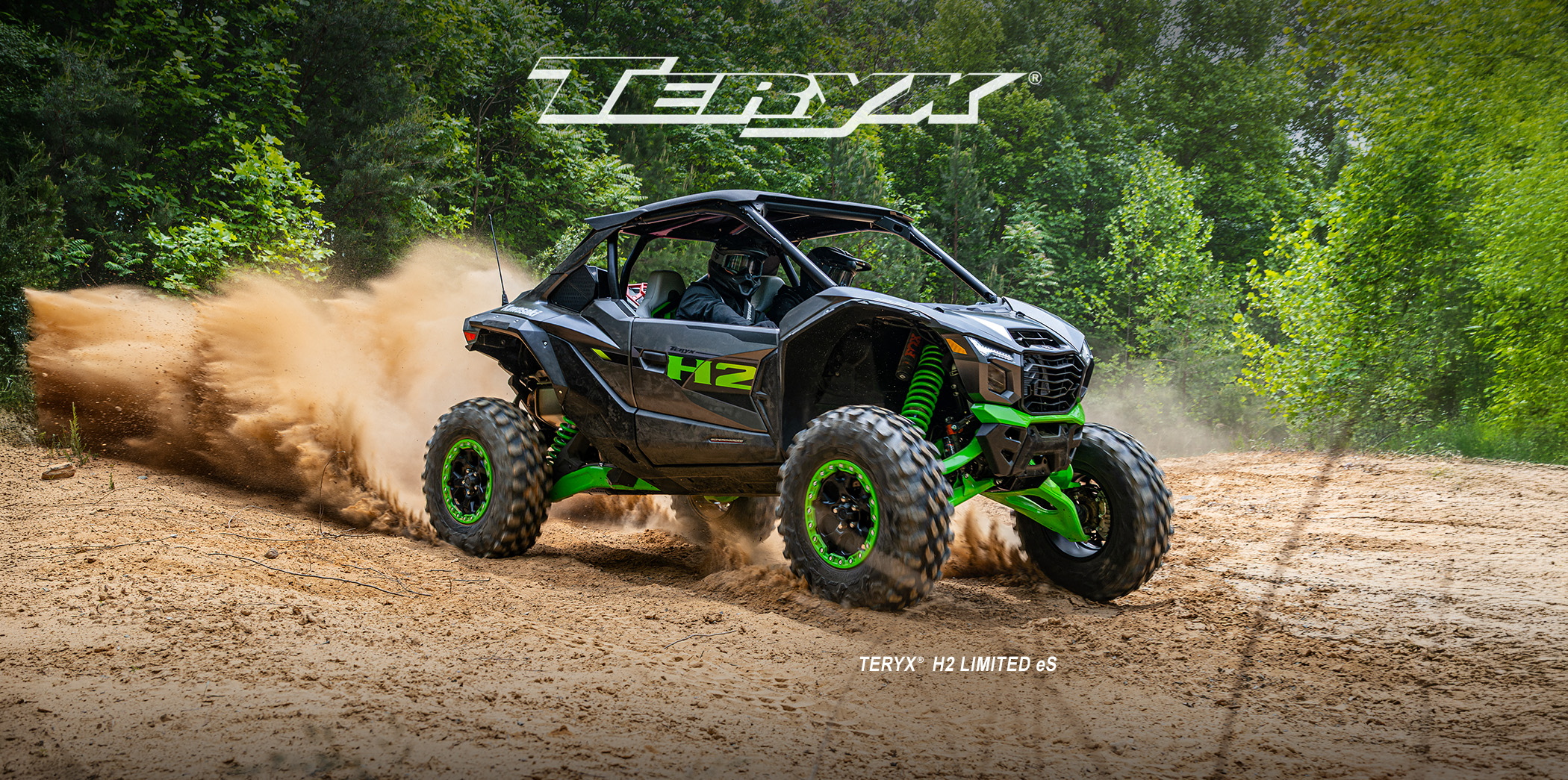 Teryx racing on a dirt lot
