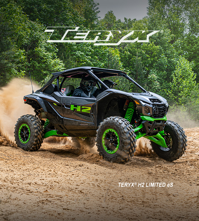 Teryx racing on a dirt lot