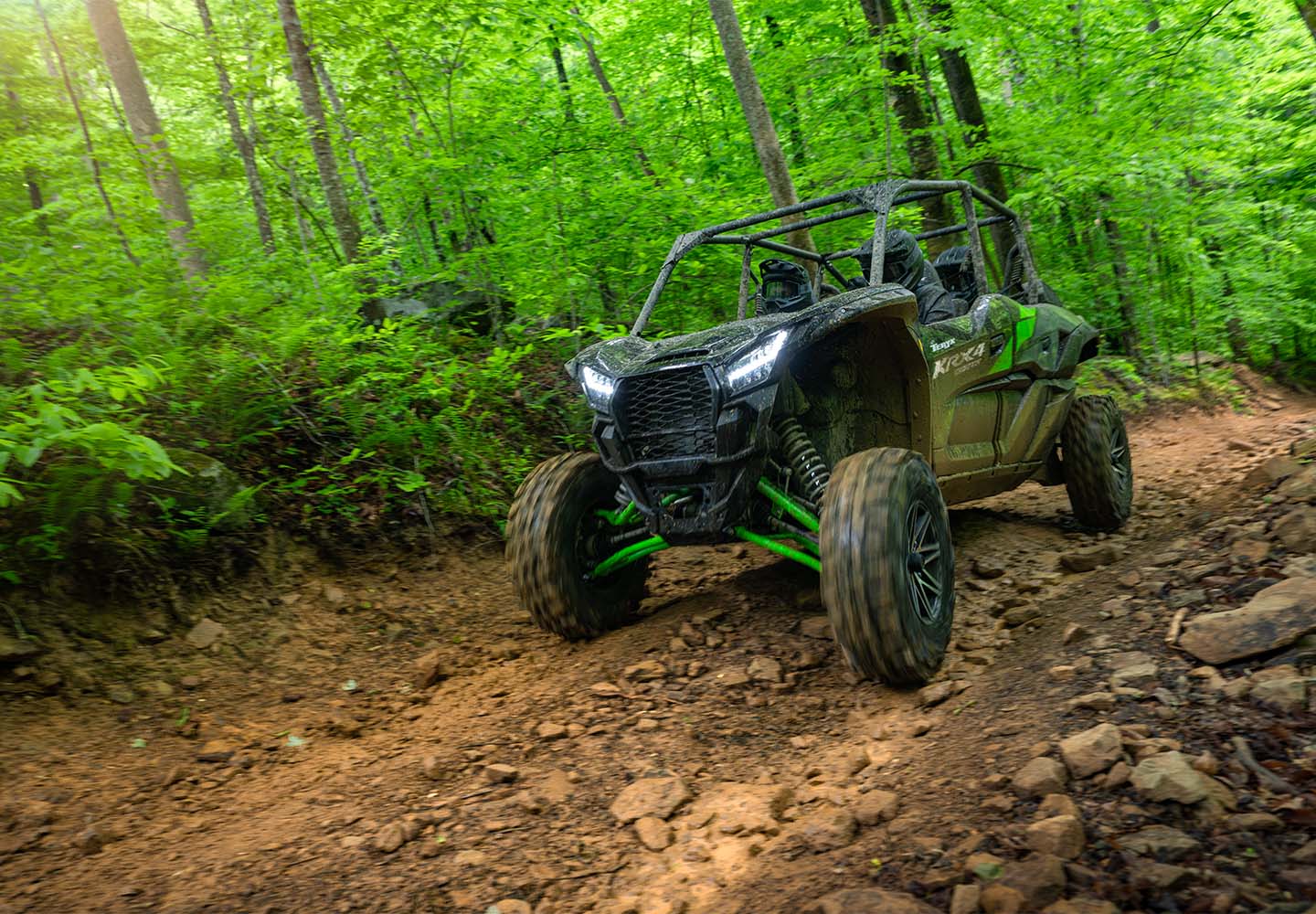 Teryx driving through a dirt path