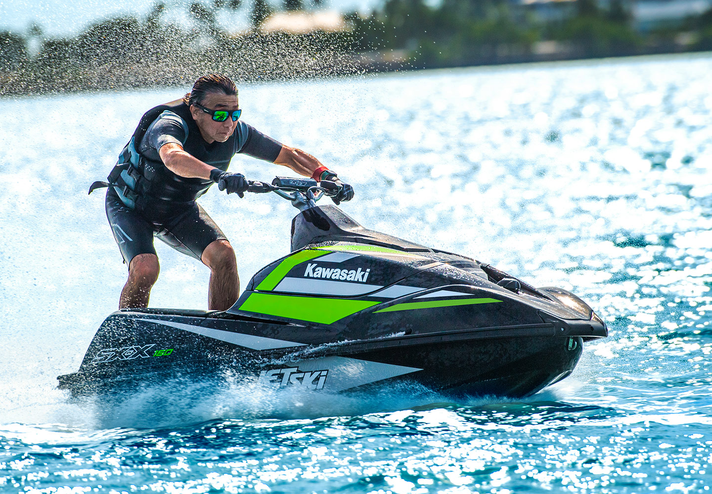 KAWASAKI Jet Ski pulling a water skier