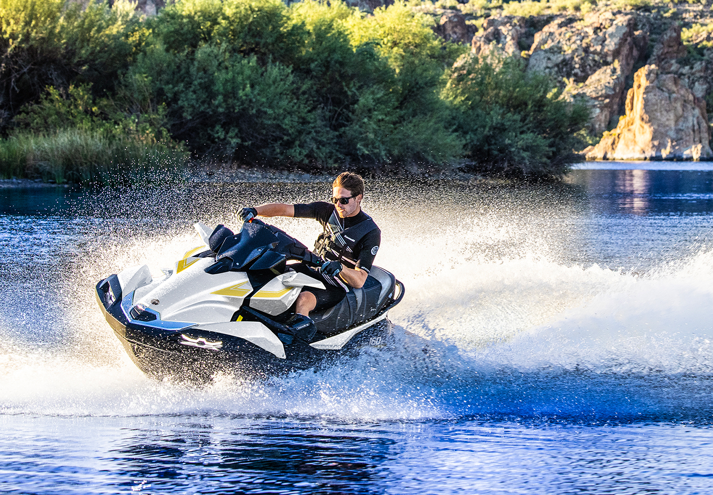 KAWASAKI Jet Ski pulling a water skier