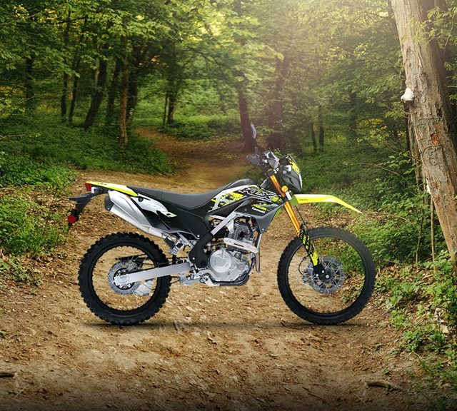 Image of 2023 KLX230 SE in action