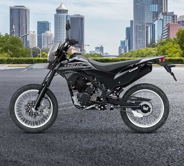 Image of 2026 KLX150SM in action