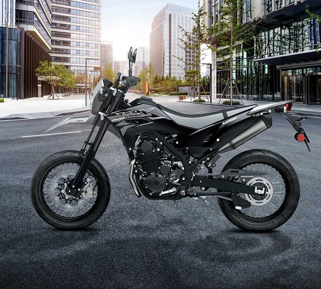 Image of 2026 KLX230SM in action